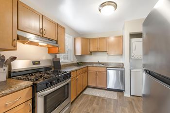Kitchen featuring stainless steel appliances and granite countertops